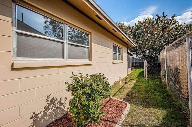 view of property exterior featuring a yard