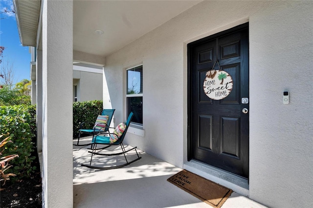 property entrance with a porch