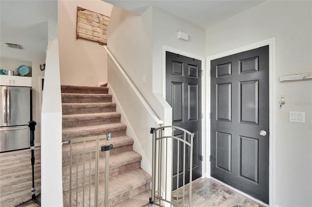 entrance foyer with hardwood / wood-style flooring