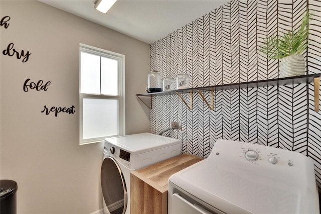 laundry area with washer and clothes dryer