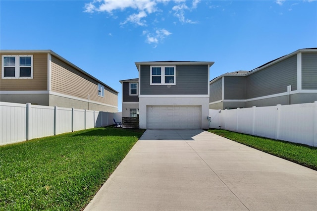 view of front facade with a garage and a front yard