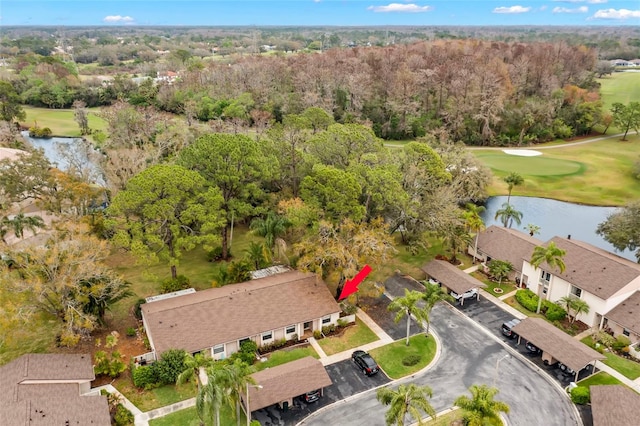 bird's eye view with golf course view and a water view