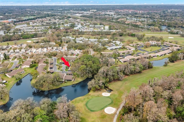 aerial view with a residential view and a water view