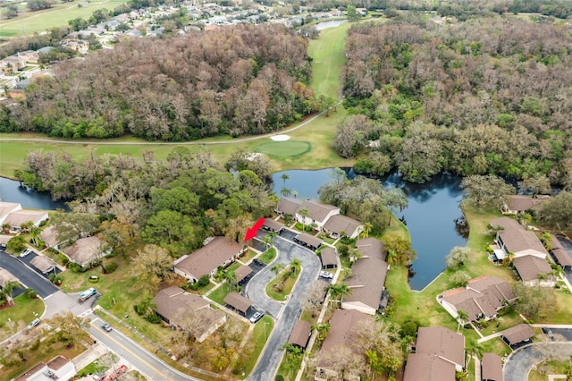 bird's eye view featuring a water view and a residential view