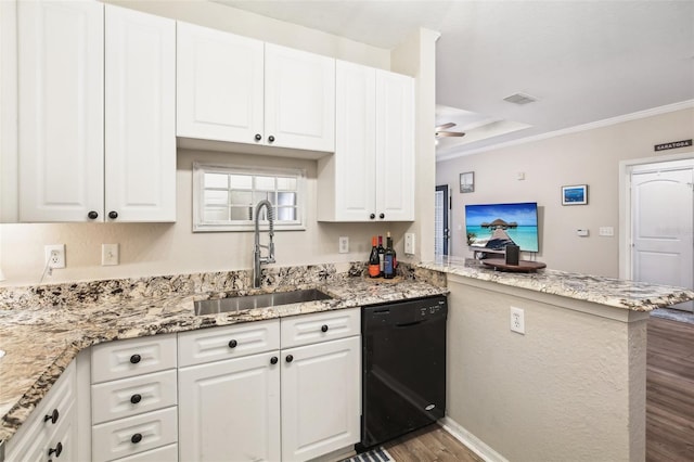4221 W Spruce St Unit 1414, Tampa, FL 33607 - kitchen with white cabinetry, dishwasher, sink, and kitchen peninsula