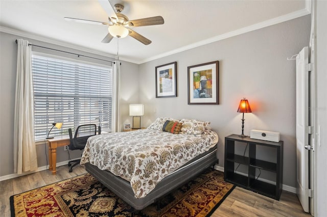 4221 W Spruce St Unit 1414, Tampa, FL 33607 - bedroom with ceiling fan, ornamental molding, and light hardwood / wood-style flooring