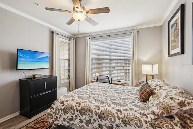 4221 W Spruce St Unit 1414, Tampa, FL 33607 - bedroom with hardwood / wood-style floors, crown molding, and ceiling fan