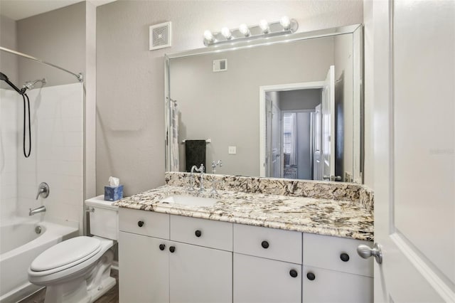 4221 W Spruce St Unit 1414, Tampa, FL 33607 - full bathroom featuring vanity, shower / bathtub combination, and toilet
