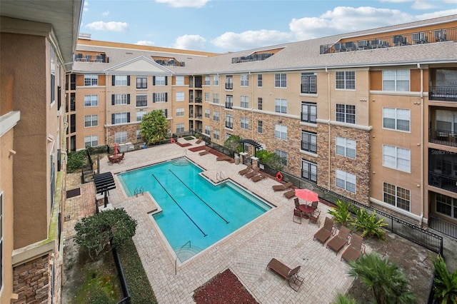 4221 W Spruce St Unit 1414, Tampa, FL 33607 - view of pool with a patio