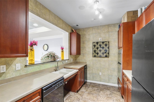 4221 W Spruce St Unit 1414, Tampa, FL 33607 - kitchen with sink, tile walls, stainless steel fridge, black dishwasher, and decorative backsplash