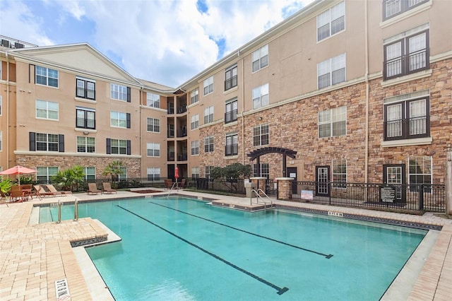 4221 W Spruce St Unit 1414, Tampa, FL 33607 - view of swimming pool with a patio