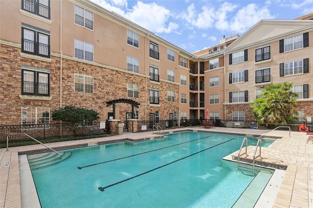 4221 W Spruce St Unit 1414, Tampa, FL 33607 - view of swimming pool with a patio
