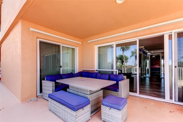 7432 Sunshine Skyway Ln S Unit 206, Saint Petersburg, FL 33711 - view of patio / terrace with an outdoor living space