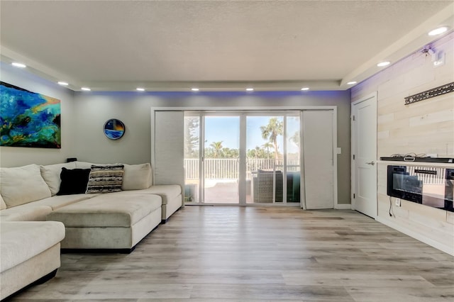 7432 Sunshine Skyway Ln S Unit 206, Saint Petersburg, FL 33711 - living room with light wood-type flooring