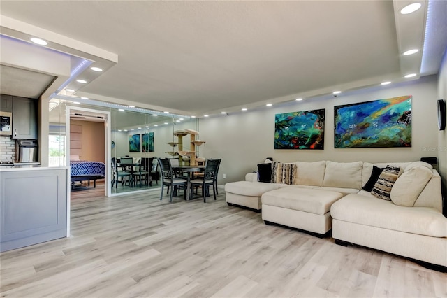 7432 Sunshine Skyway Ln S Unit 206, Saint Petersburg, FL 33711 - living room with light hardwood / wood-style floors