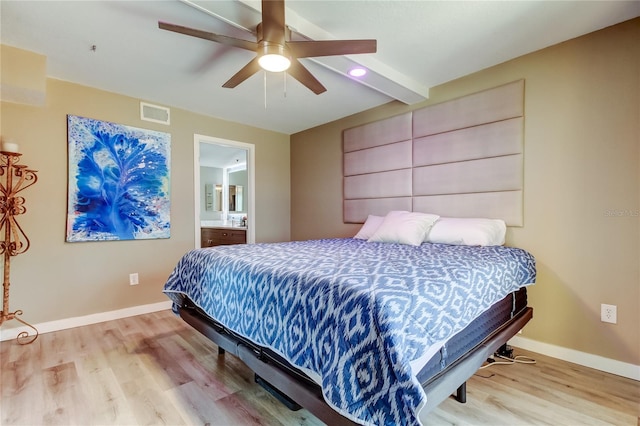 7432 Sunshine Skyway Ln S Unit 206, Saint Petersburg, FL 33711 - bedroom with ceiling fan, ensuite bathroom, beamed ceiling, and hardwood / wood-style floors
