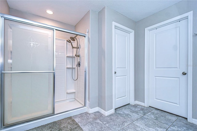 bathroom featuring an enclosed shower