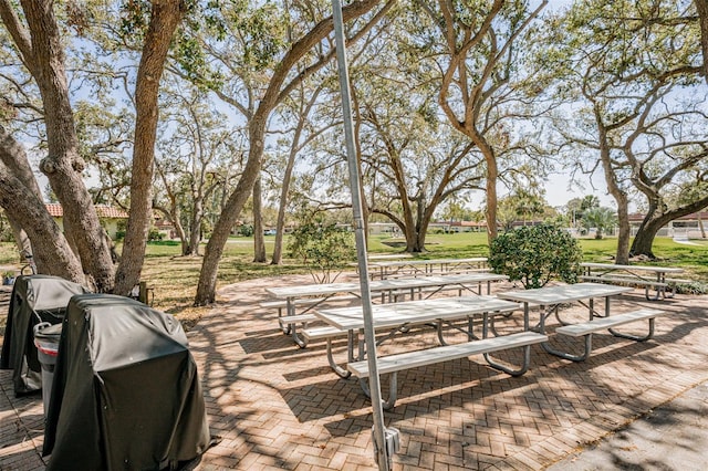 view of property's community featuring a patio