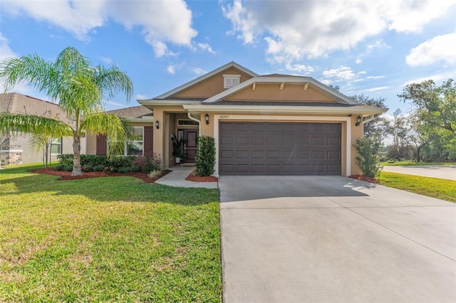 view of front of house featuring a garage and a front yard