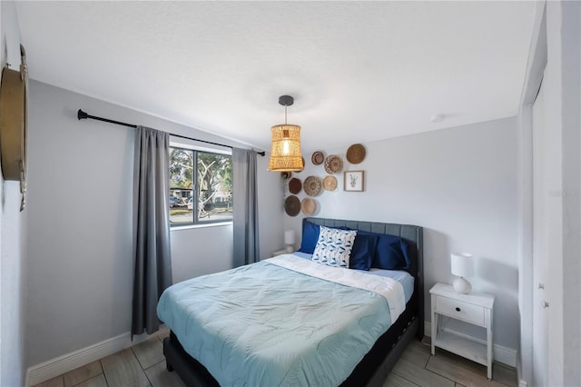 9169 Robin Rd, Seminole, FL 33777 - bedroom featuring hardwood / wood-style flooring