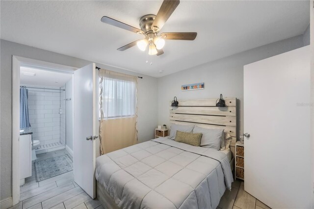 9169 Robin Rd, Seminole, FL 33777 - bedroom with ensuite bathroom and ceiling fan