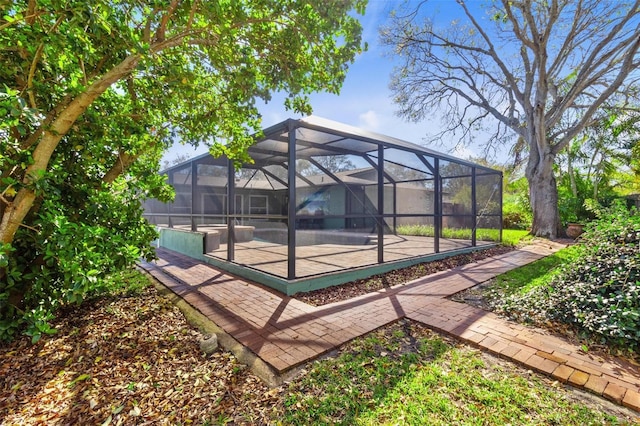 exterior space featuring a patio and a lanai