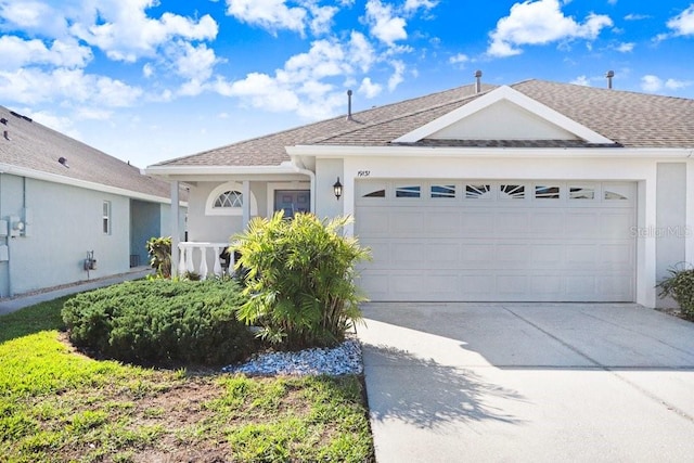 ranch-style home with a garage