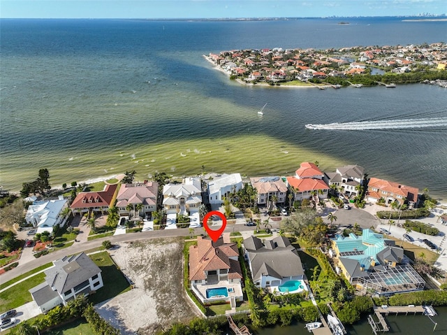 aerial view featuring a residential view and a water view