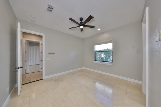 spare room with ceiling fan, baseboards, visible vents, and recessed lighting