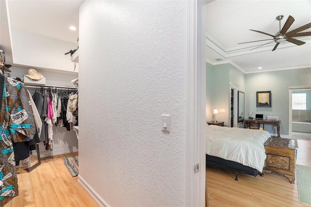 interior space with ceiling fan and wood finished floors