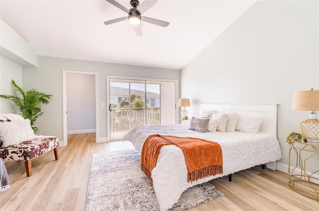 bedroom featuring light hardwood / wood-style flooring, access to outside, ceiling fan, and vaulted ceiling