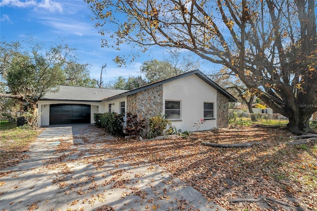 ranch-style home with a garage