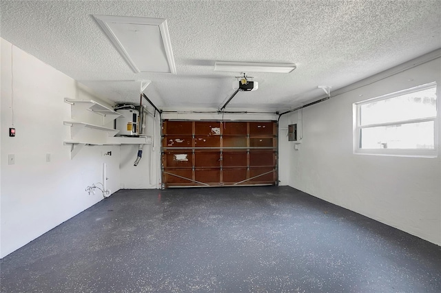 garage with a garage door opener and electric panel