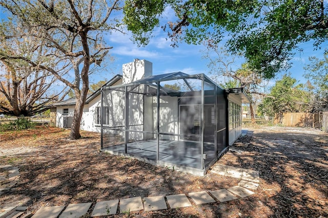 exterior space featuring a lanai