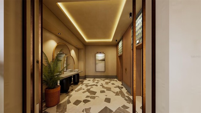 15000 Madeira Way Unit 411, Madeira Beach, FL 33708 - hallway featuring a raised ceiling