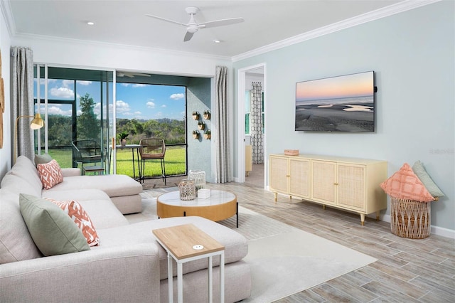 living room with crown molding and ceiling fan