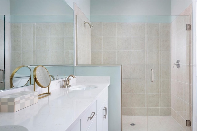 bathroom with vanity and an enclosed shower