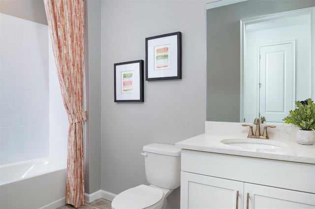 full bathroom featuring vanity, shower / tub combo with curtain, and toilet