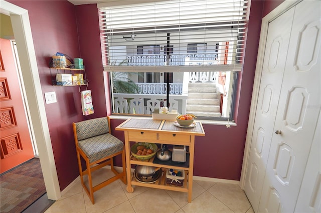 sitting room with light tile patterned flooring