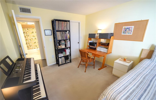 carpeted bedroom with heating unit