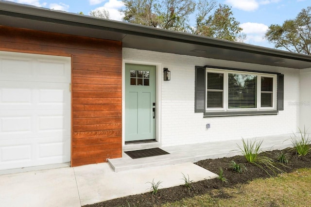 property entrance featuring a garage