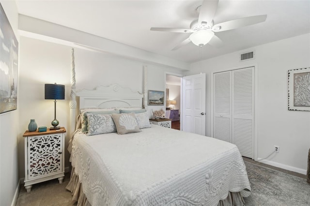 bedroom featuring carpet, a closet, and ceiling fan