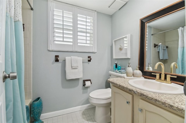 full bath with tile patterned floors, vanity, toilet, and baseboards