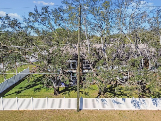 exterior space featuring a yard and a fenced backyard