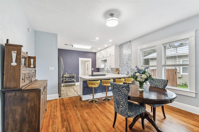 dining room featuring light hardwood / wood-style floors