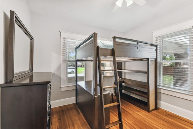 bedroom featuring wood-type flooring and ceiling fan