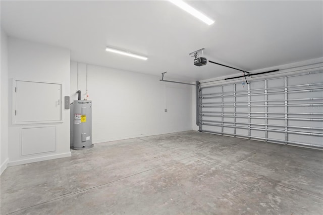 garage featuring water heater and a garage door opener