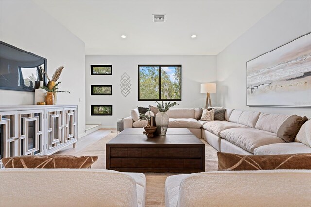 532 W Plaza Pl Unit 2, Tampa, FL 33602 - living area with recessed lighting, light wood-style floors, baseboards, and a glass covered fireplace