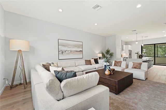 532 W Plaza Pl Unit 2, Tampa, FL 33602 - living room featuring light wood-style flooring, recessed lighting, and baseboards