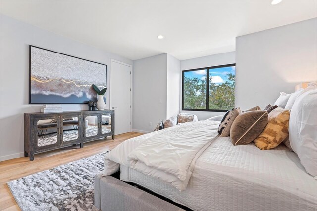 532 W Plaza Pl Unit 2, Tampa, FL 33602 - bedroom with wood finished floors, baseboards, and recessed lighting